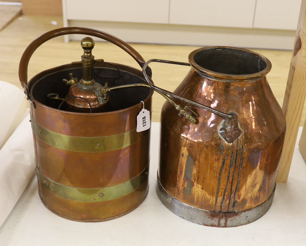 A banded copper and brass bound pail, a copper churn and a Germstroud sprayer, churn 38cm high